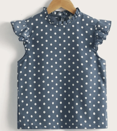 Blauwe bloes met witte bolletjes